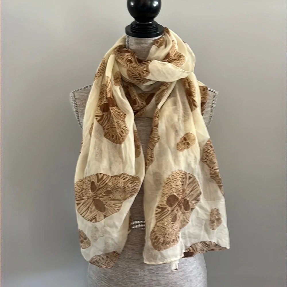 Italy Design 100 % polyester super lightweight and flows.  Has a skull design.